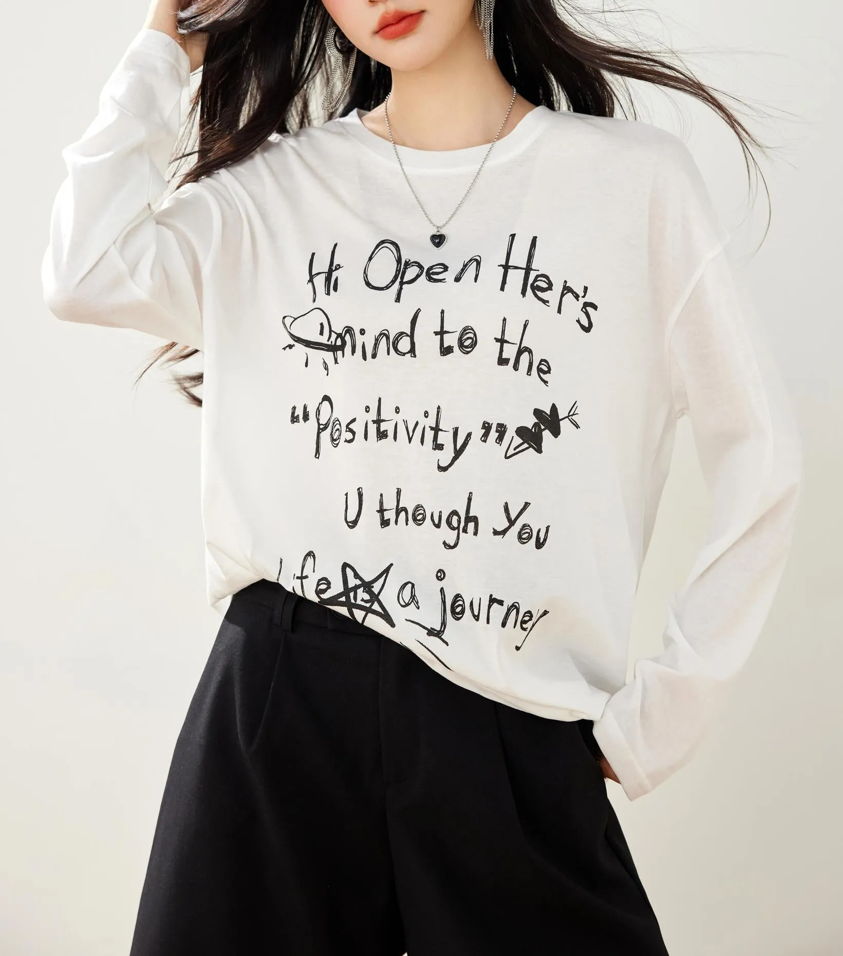 White T-Shirt with Graffiti and Round Neck Design
