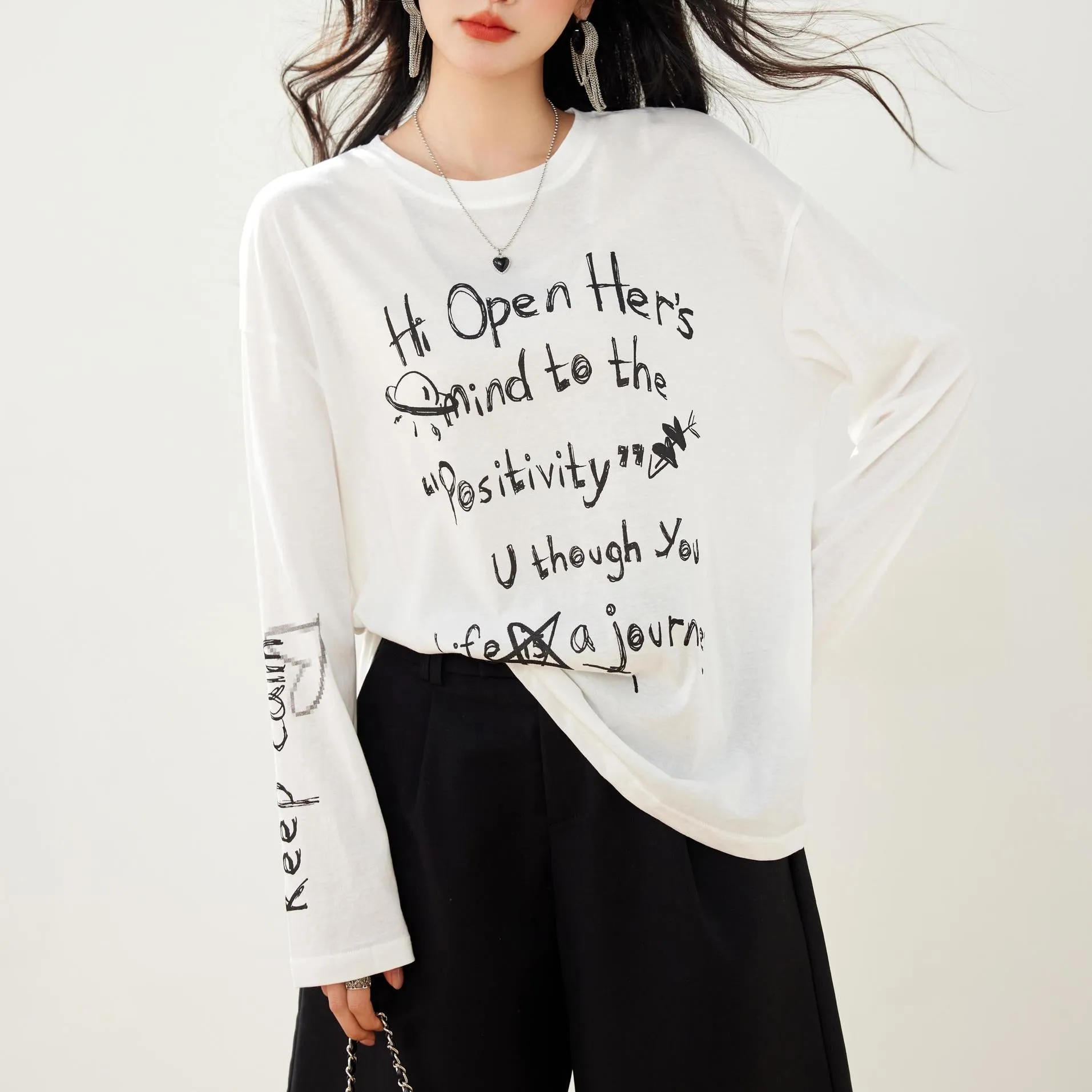 White T-Shirt with Graffiti and Round Neck Design