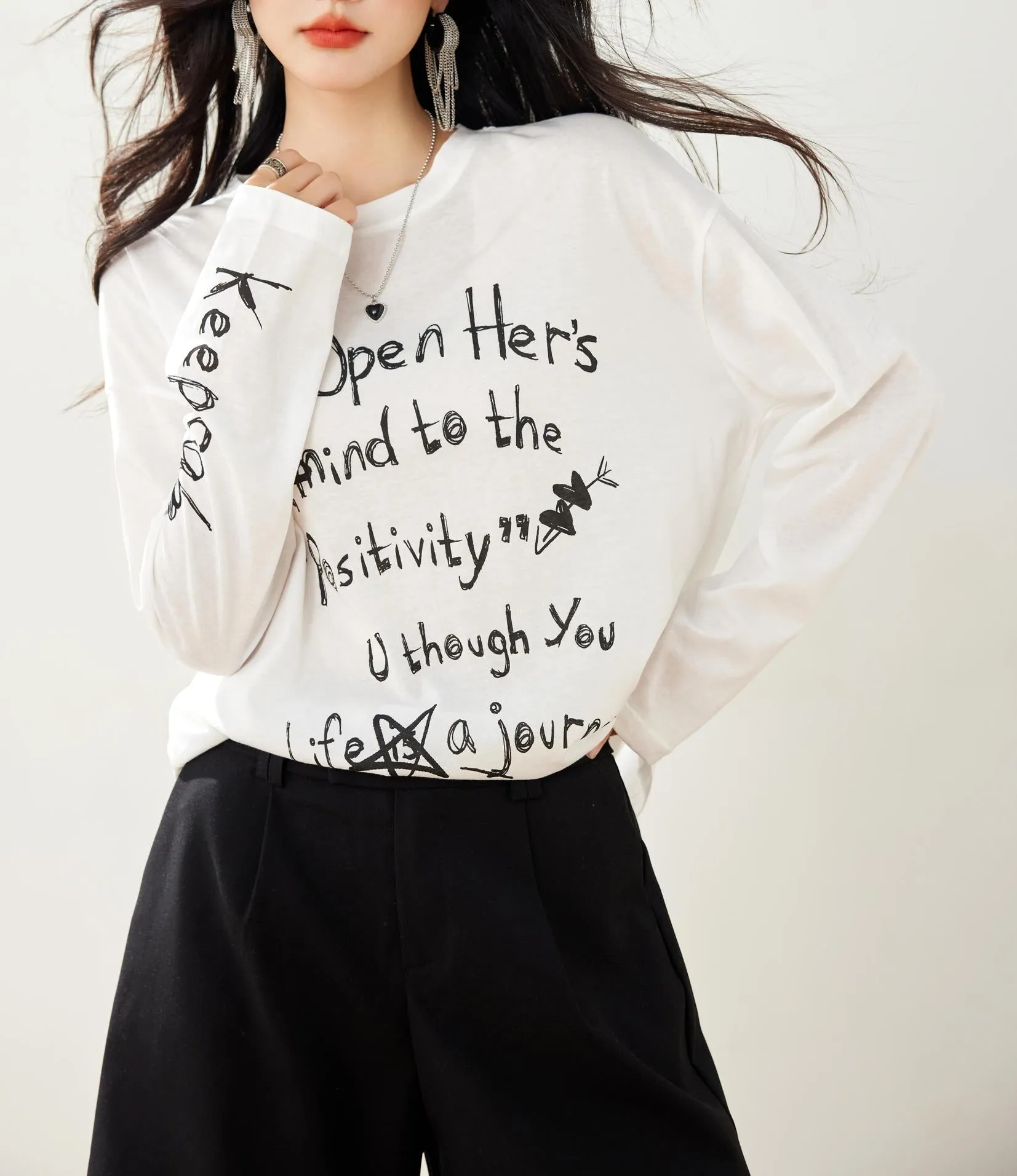 White T-Shirt with Graffiti and Round Neck Design