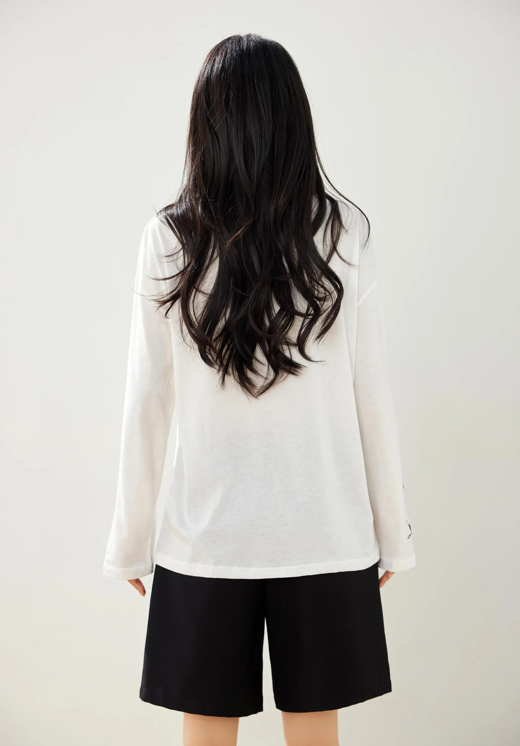 White T-Shirt with Graffiti and Round Neck Design
